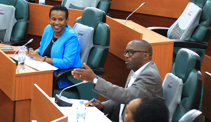 The chairperson of the senatorial Standing Committee on Social Affairs, Human Rights and Petitions, Gallican Niyongana, makes a point during the meeting with the Minister for Public Service ad Labour, Fanfan Rwanyindo Kayiranga (left) at parliament yesterday. Sam Ngendahimana.