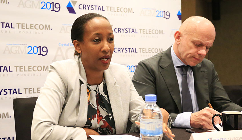 Iza Irame, the chief executive of Crystal Telecom (left), and Bart Hofker, the chief executive of MTN Rwanda, at Crystal Telecom Fourth Annual General Assembly Friday morning. Sam Ngendahimana.