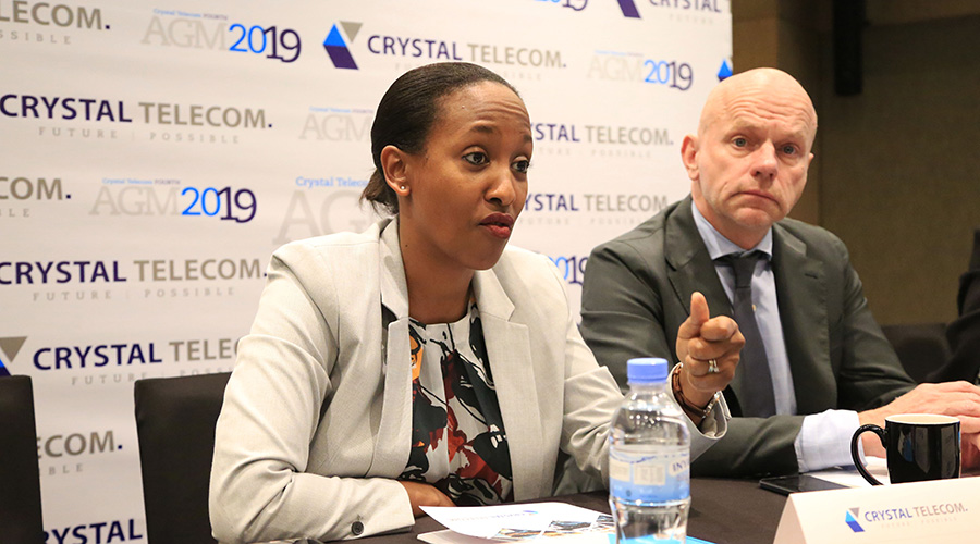 Iza Irame (left), the chief executive of Crystal Telecom, and Bart Hofker, the chief executive of MTN Rwanda, at Crystal Telecom Annual General Assembly Friday morning. / Sam Ngendahimana