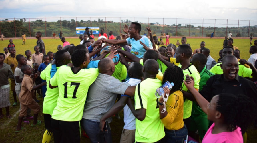 Gihango Sector players are joined by their fans in celebrations after edging out Mamba Sector in semi-finals on Friday. / Courtesy