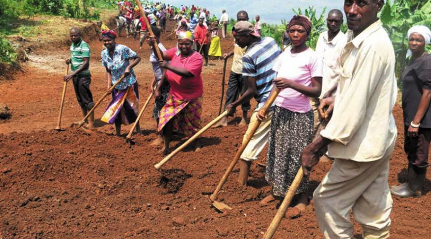 Residents clear a street under the VUP framework. VUP is a social protection initiative to improve the welfare of the most vulnerable. / File