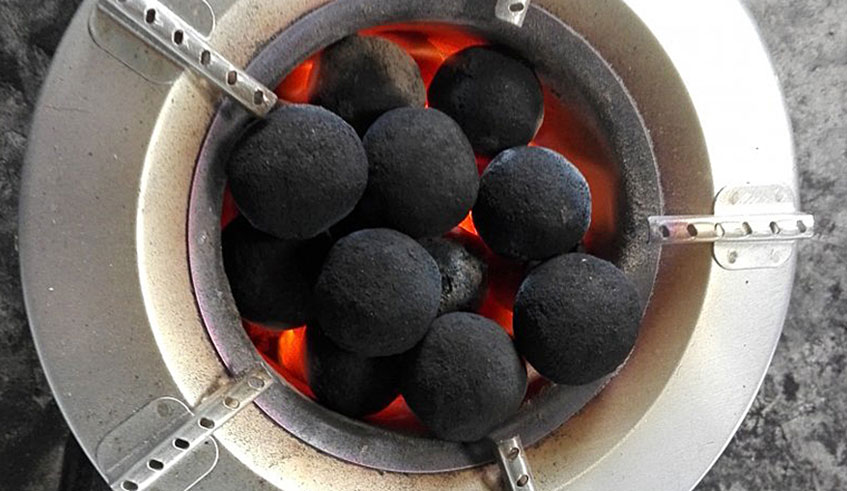 Briquettes in a burner. There are plans to scale up the use of briquettes in the country by starting with large scale users of wood fuel, such as police and military camps, prisons, schools, and hotels.Net photo.