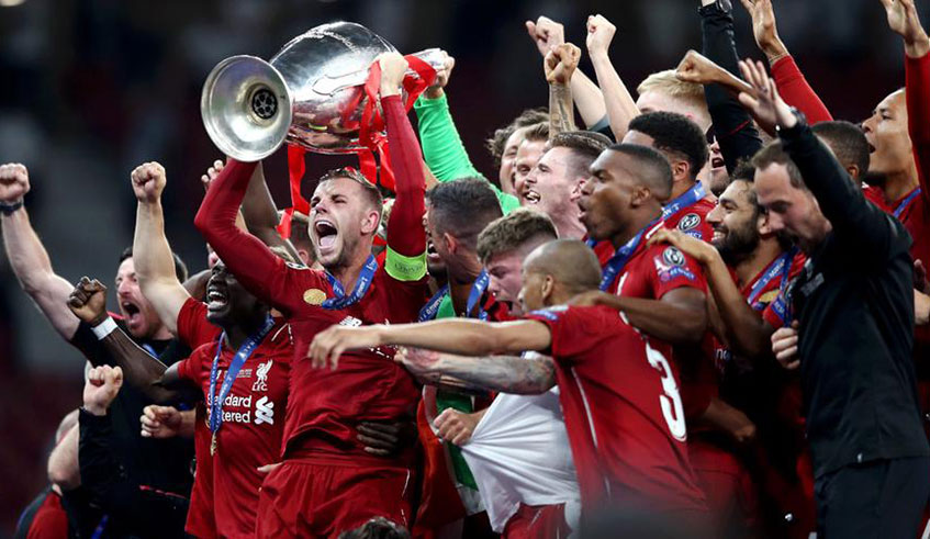 Jordan  Henderson and his teammates celebrate the Champions League title on Saturday. Jurgen Klopp has won his first trophy since the 2012 German double with Borussia Dortmund. Net.