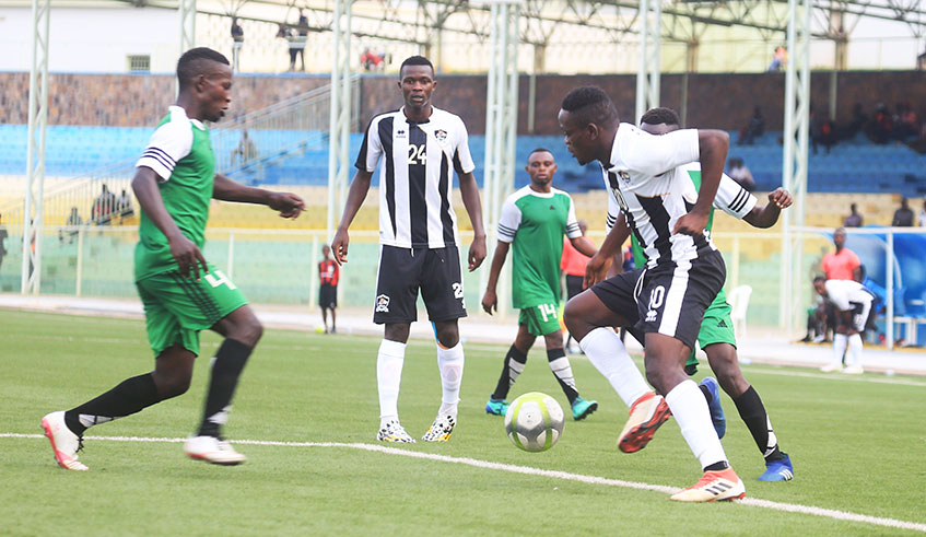 Muhadjiri Hakizimana (on the ball, #10) scored from a free-kick just after three minutes to give APR an early lead during the 2-0 win over Rwamagana City at Kigali Stadium on Wednesday. Sam Ngendahimana.