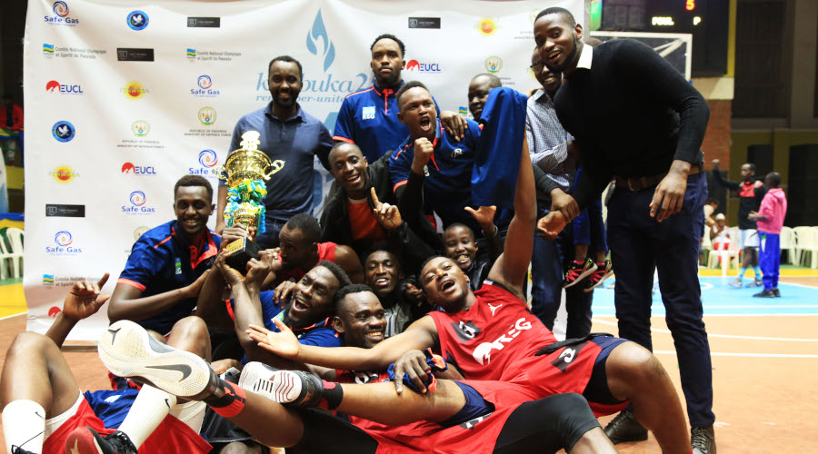 Rwanda Energy Group (REG) players celebrate with the trophy after overcoming Patriots 74-71 to retain the title at Amahoro Stadium on Saturday. / Sam Ngendahimana