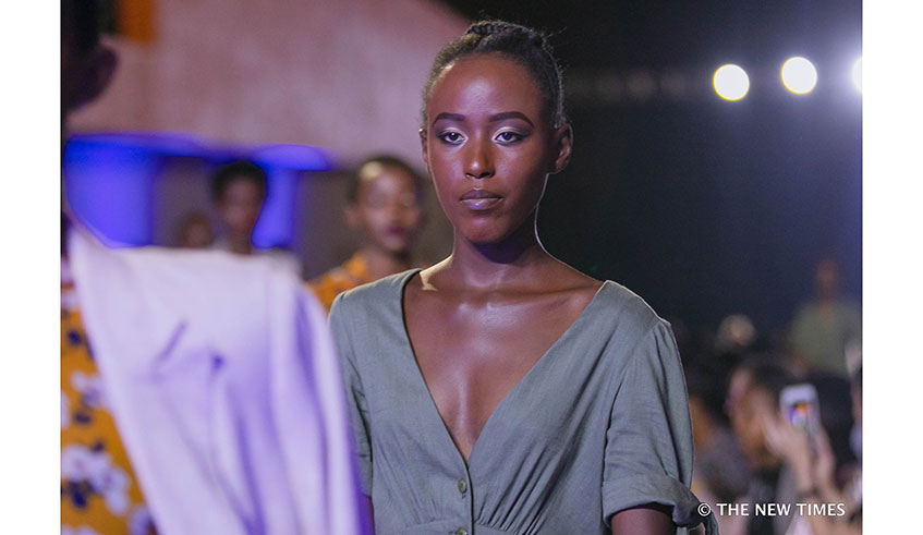 Rwandan designer Sonia Mugabo (right), seen here with a model, was among the designers who showcased their designs at the just concluded Rwanda Fashion Week. / Emmanuel Kwizera