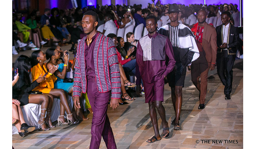 Rwandan designer Sonia Mugabo (right), seen here with a model, was among the designers who showcased their designs at the just concluded Rwanda Fashion Week. / Emmanuel Kwizera