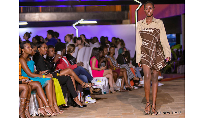 Rwandan designer Sonia Mugabo (right), seen here with a model, was among the designers who showcased their designs at the just concluded Rwanda Fashion Week. / Emmanuel Kwizera