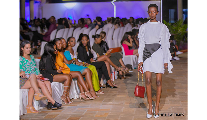 Rwandan designer Sonia Mugabo (right), seen here with a model, was among the designers who showcased their designs at the just concluded Rwanda Fashion Week. / Emmanuel Kwizera