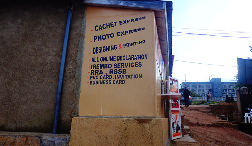 A wall showing several services offered by one small business in Kacyiru Sector. Simon Peter Kaliisa.