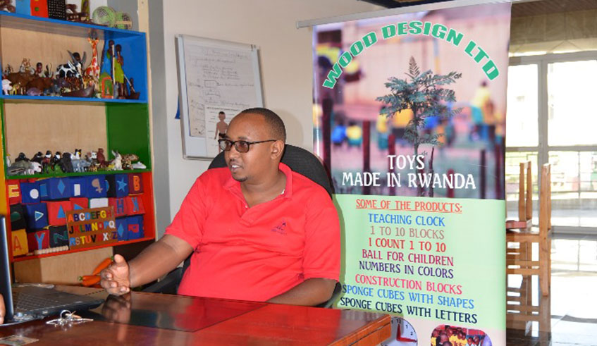 Janvier Niyigena talks about his business. Photos by Simon Peter Kaliisa