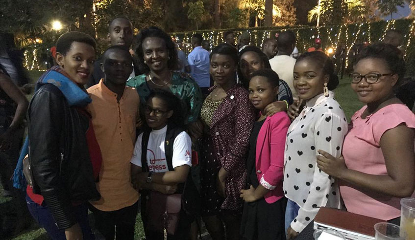 The hotel's Director of Human Resource Nicole Ingabire (in green) posing with other employees on Friday at the after party / Photo by James Peter Nkurunziza. 