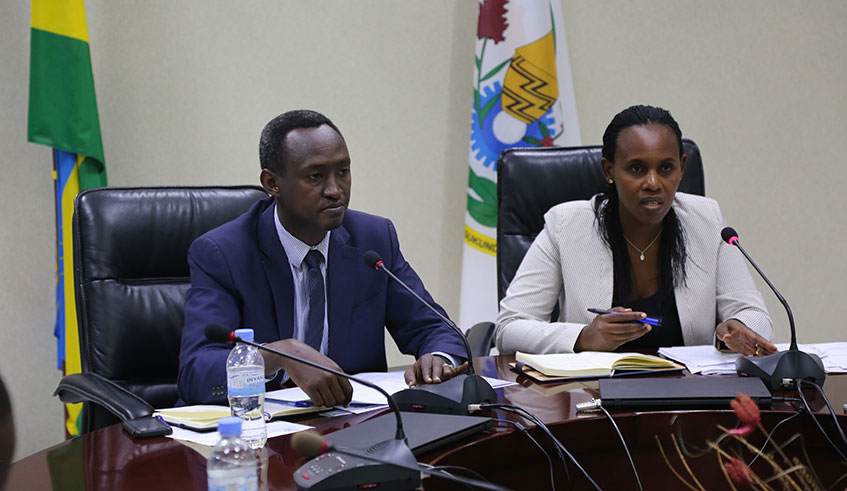 The State Minister for Economic Planning, Claudine Uwera, and deputy director-general for National Institute of Statistics, Ivan Murenzi (left), at a news briefing about the countryu2019s economic performance in the first quarter of 2019 during which the GPD grew by 8.4 per cent, at the Ministry of Finance and Economic Planning headquarters in Kigali yesterday.  Craish Bahizi. 