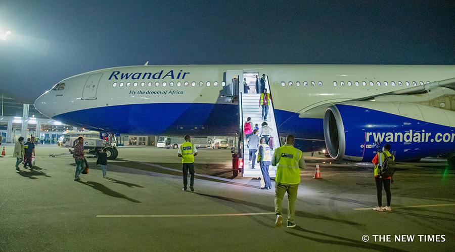 Passengers board Airbus A330 at Kigali International Airport before embarking on a 16-hour flight to Guangzhou, China's third largest city. / Emmanuel Kwizera