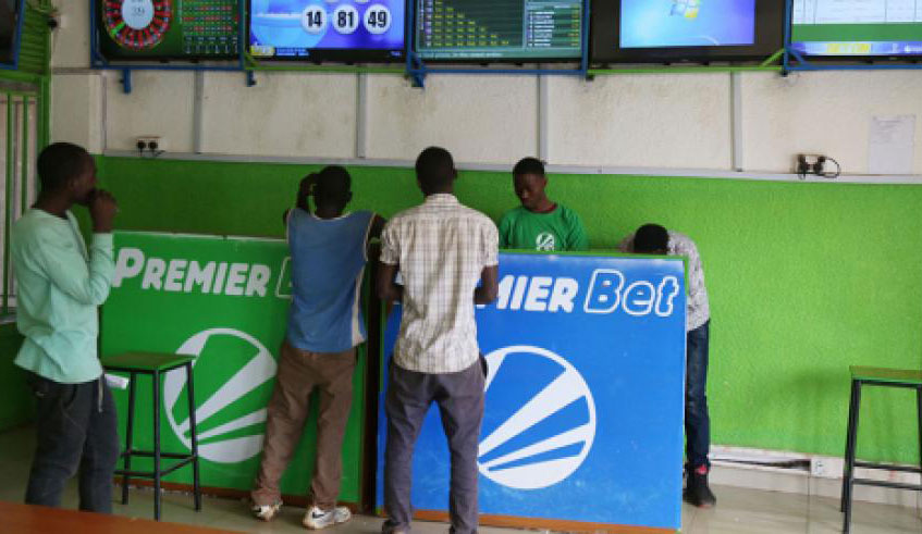 Punters at one of Premier Betting shops in Kigali. Sam Ngendahimana.
