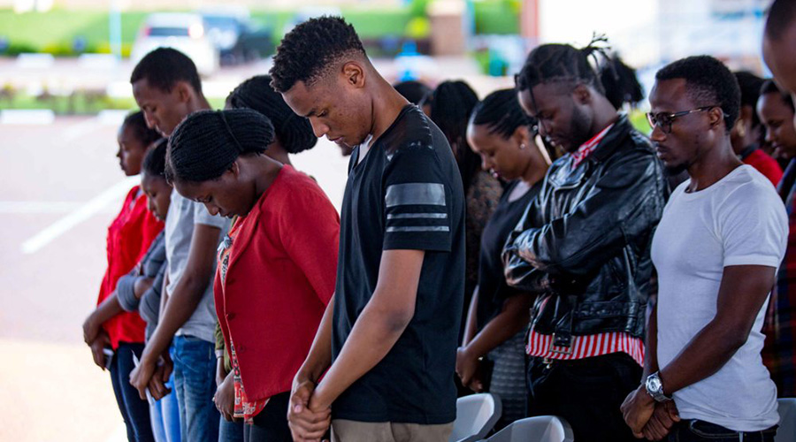 Students take a moment of silence during the commemoration.