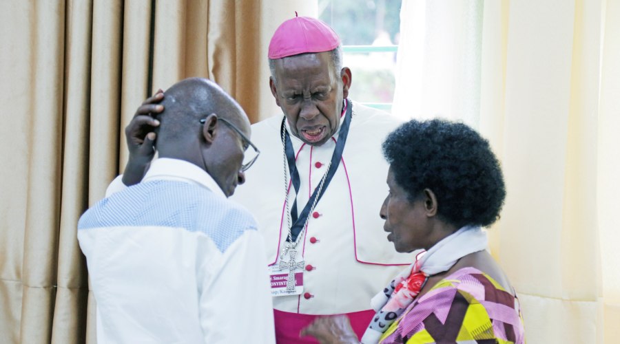 Smaragde Mbonyintege, the bishop of Kabgayi Diocese interacts with other participants during the conference in Kigali yesterday. / Sam Ngendahimana