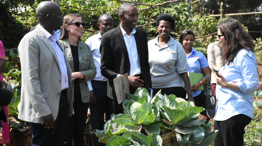 USAID global Senior Administrator Sonali Korde (right) and other officials during a tour of Farmer Field School in Ryamirenge Village, Munyiginya Sector in Rwamagana District. / Jean de Dieu Nsabimana