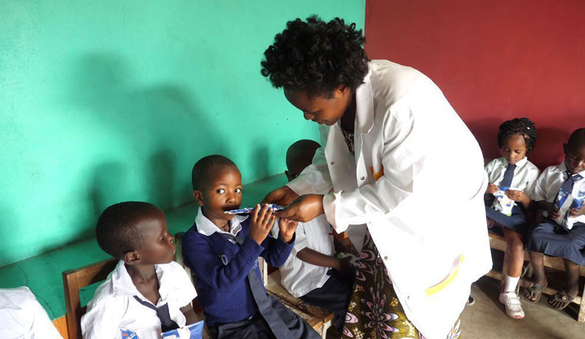 Children from historically marginalised households in Rubavu District are served with milk at Malaika Kindegarten in Cyanzarwe Sector. Ru00e9gis Umurengezi.