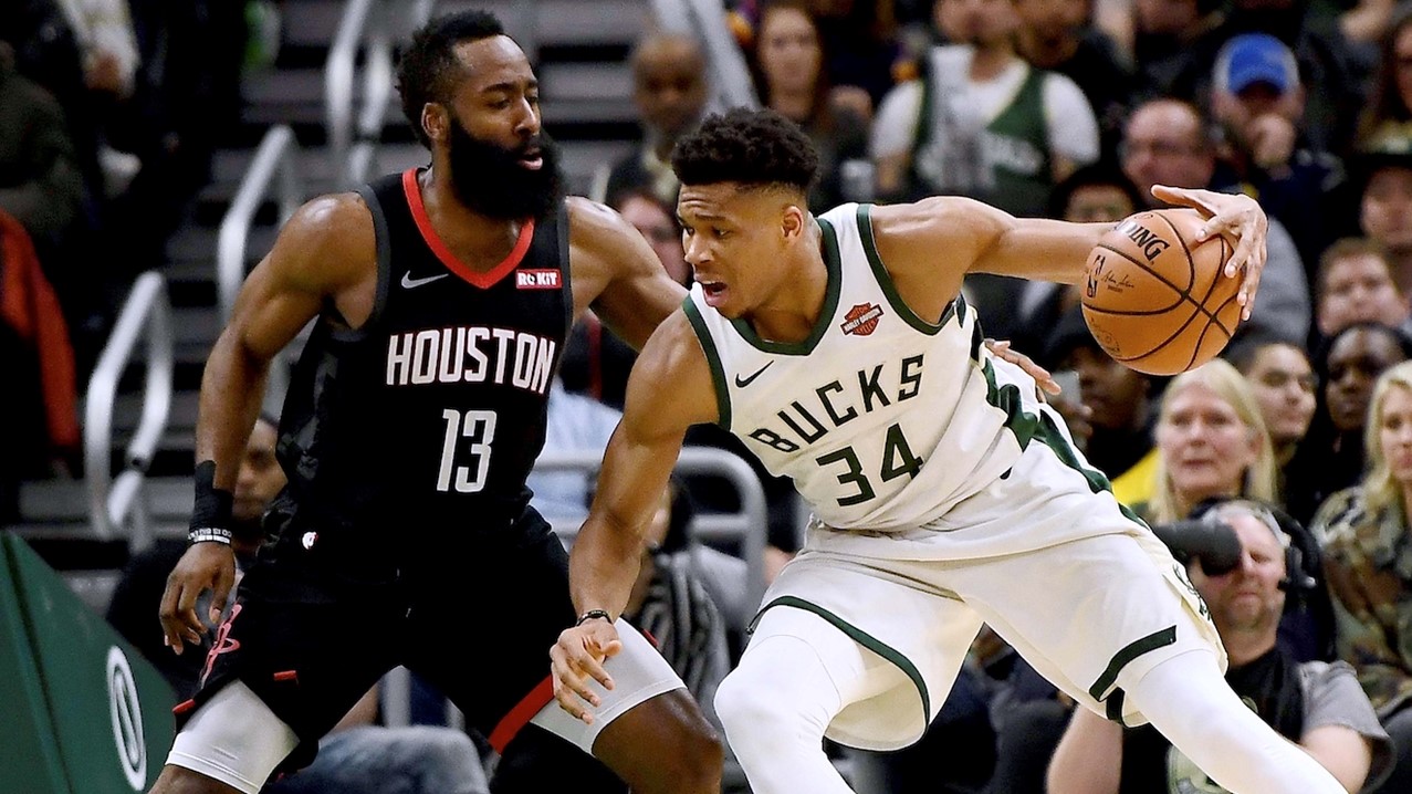 Giannis Antetokounmpo (R), who beat last year's winner James Harden (L), received 78 of the 101 possible first-place votes. Net