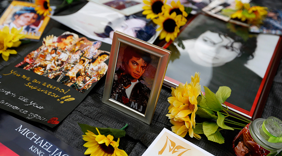 Flowers and pictures are seen outside Michael Jackson's final resting place at Forest Lawn Memorial Garden to mark the 10th anniversary of Jackson's death in Los Angeles, the United States, June 25, 2019. / Xinhua