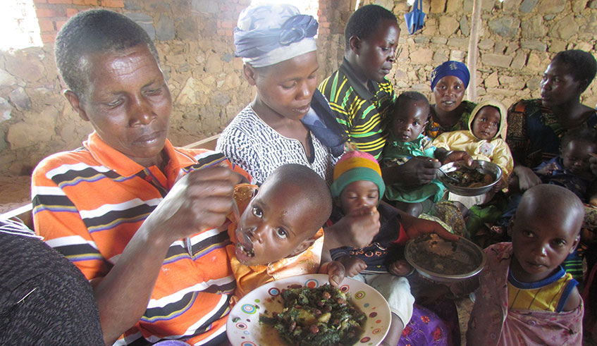 Nyabihu mothers feed their children with a balanced diet through the home based Early Childhood Development Centres (ECDs). Ru00e9gis Umurengezi.
