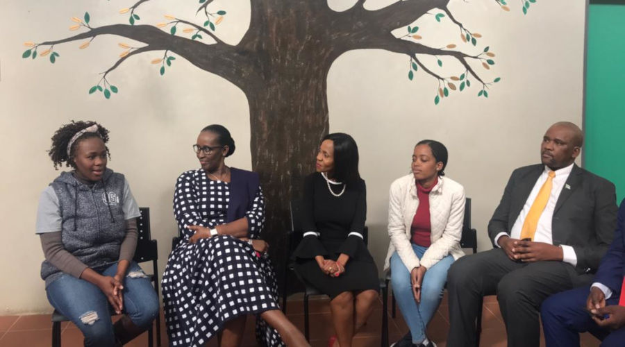 First Lady Jeannette Kagame and First lady Neo Masisi interact with young people receiving treatment and care at the Adolescent Centre. / Courtesy