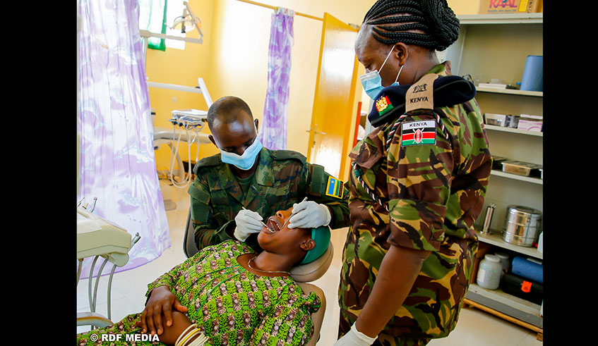 Rwandan and Kenyan Soldiers volunteered to help the Rwamagana Provincial Hospital community during a dental screening. Courtesy photos.