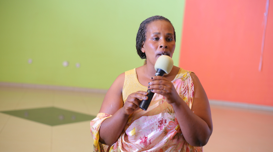 Kenyana speaks during the graduation ceremony for the women who had acquired skills in hairdressing. / Courtesy