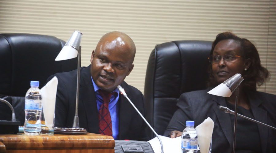 The Chairperson of the parliamentary Standing Committee on Budget and Patrimony, Omar Munyaneza (left), speaks during a recent session as his deputy Francesca Tengera looks on. / Sam Ngendahimana