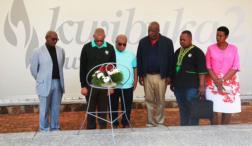 The Secretary General of South Africau2019s ruling party, African National Congress (ANC), Ace Magashule (2nd left), and his delegation honour the victims of 1994 Genocide at Kigali Genocide Memorial yesterday. They were accompanied by senior cadres of RPF-Inkotanyi Sheikh Abdul Karim Harelimana (extreme left) and Odda Gasinzigwa (extreme right). Sam Ngendahima. 