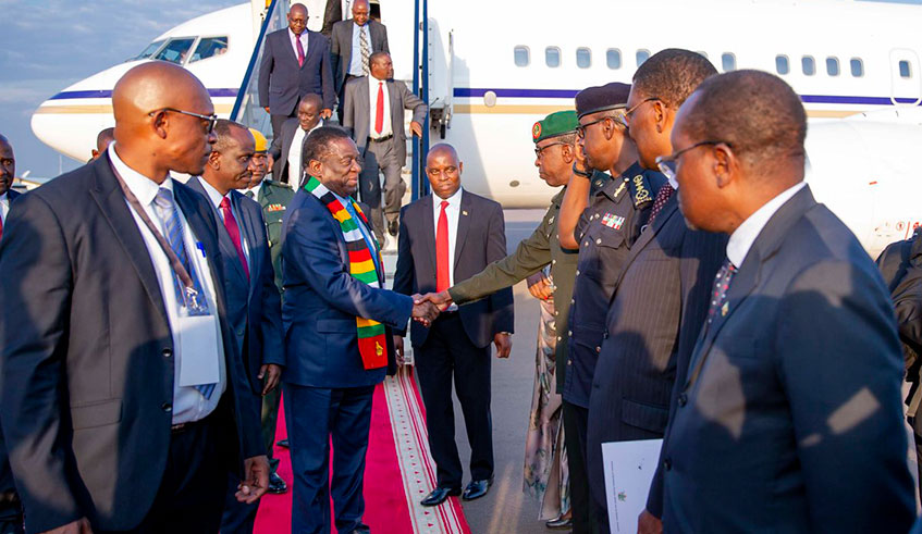 President Emmerson Mnangagwa of Zimbabwe greets top government and security officials yesterday upon his arrival at Kigali International Airport  ahead of todayu2019s liberation silver jubilee celebrations.  Courtesy.