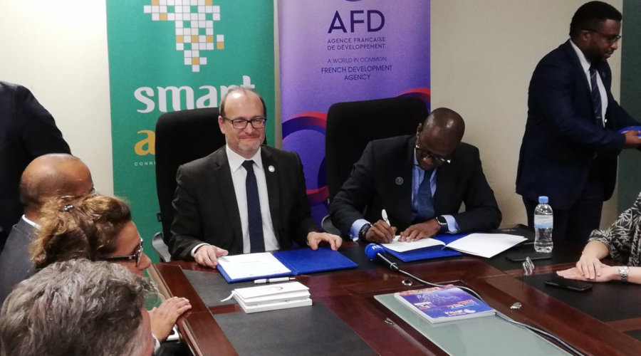 AFD chief executive Remy Rioux (left) and Smart Africa Secretariat officials sign a memorandum of understanding aimed at supporting digital transition on the African Continent, in Kigali recently. / Courtesy