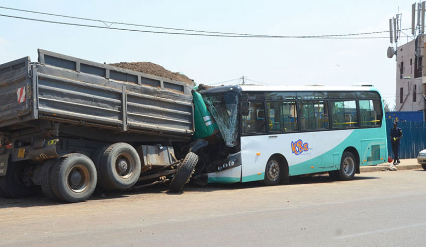 A truck and a bus after head-on collusion in Kicukiro. Traffic enforcement cameras are expected to help minimise road accidents. File.