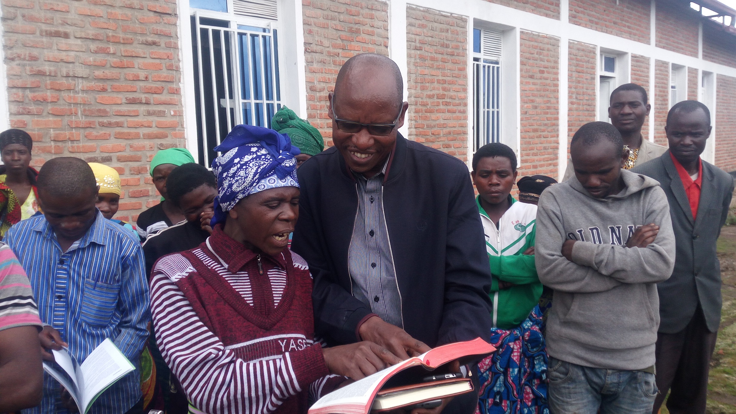 Beatrice Nyirantezimana reads the bible. This is a result of the six-month literacy programme that she is pursuing. / Ru00e9gis Umurengezi