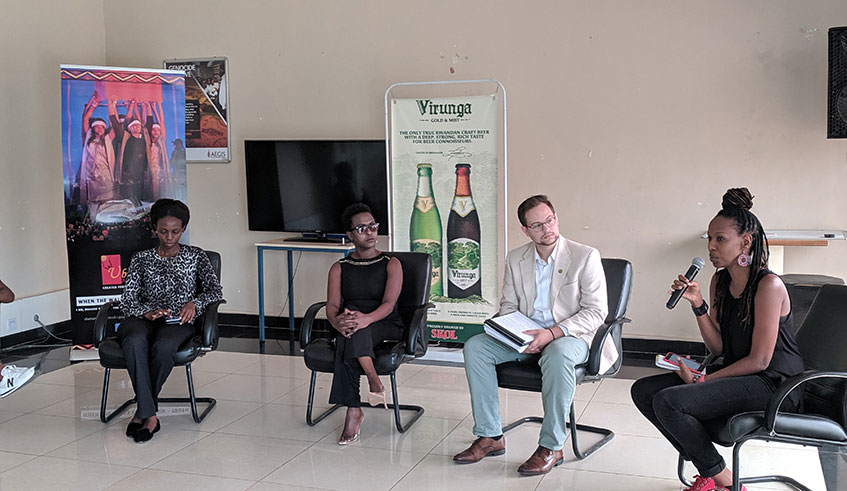 Hope Azeda (right) makes her presentation while other panelists (L-R: Emilienne Benurugo , brand manager Skol/Virunga, singer Lillian Mbabazi, Thomas West, Creative Director, collaborative Arts Ensemble (CAE) look on. Courtesy photos.