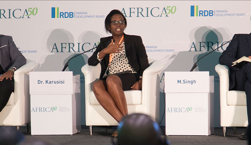 Bank of Kigali chief executive Diane Karusisi speaks at the Investment Forum in Kigali yesterday. Emmanuel Kwizera.