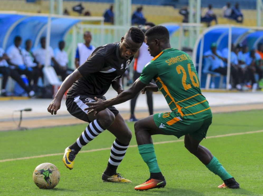 APR striker Lague Byiringiro (L) vies for the ball with Amit Shamende of Green Eagles during Mondayu2019s 1-0 victory at Kigali Stadium. / Courtesy