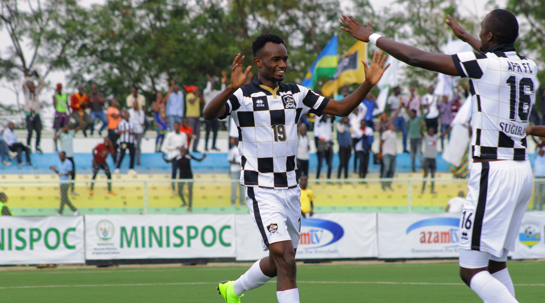 Dany Usengimana (L) celebrates with Ernest Sugira after scoring his second goal during APRu2019s 4-0 win over Heegan at Kigali Stadium on Thursday. / Courtesy