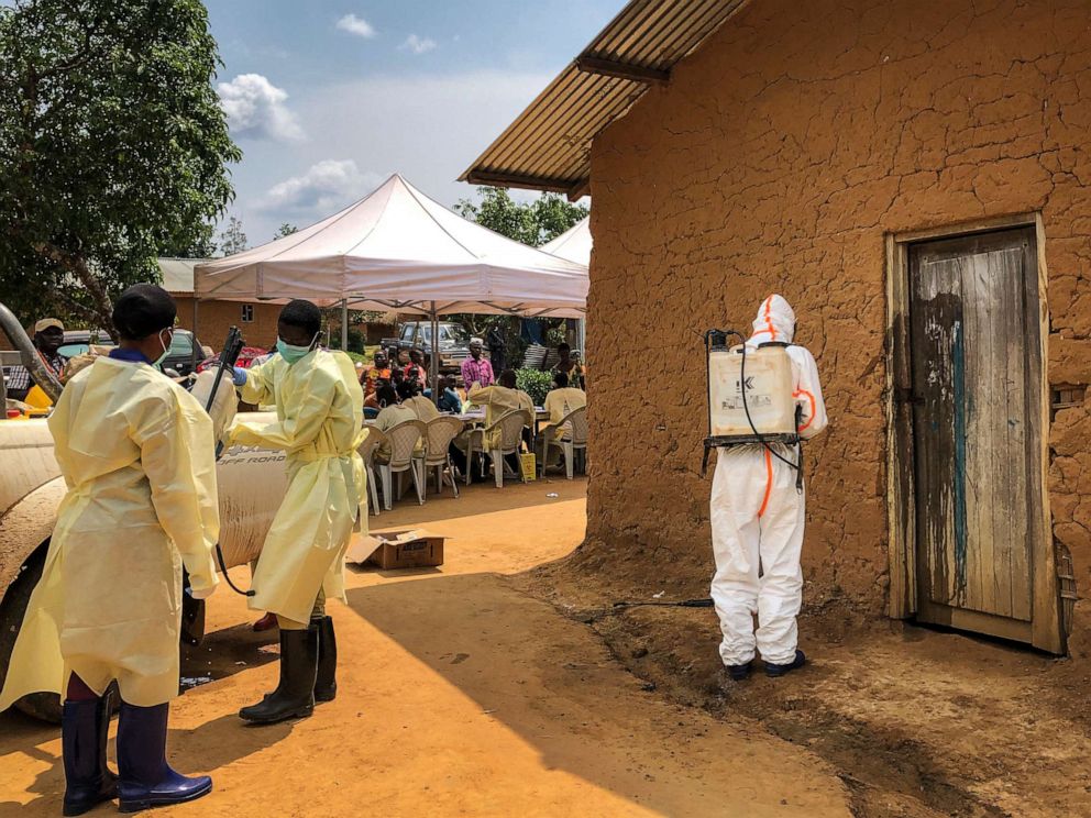 Health workers in protective gear attend to an Ebola victim in Beni, DR Congo. Net photo.
