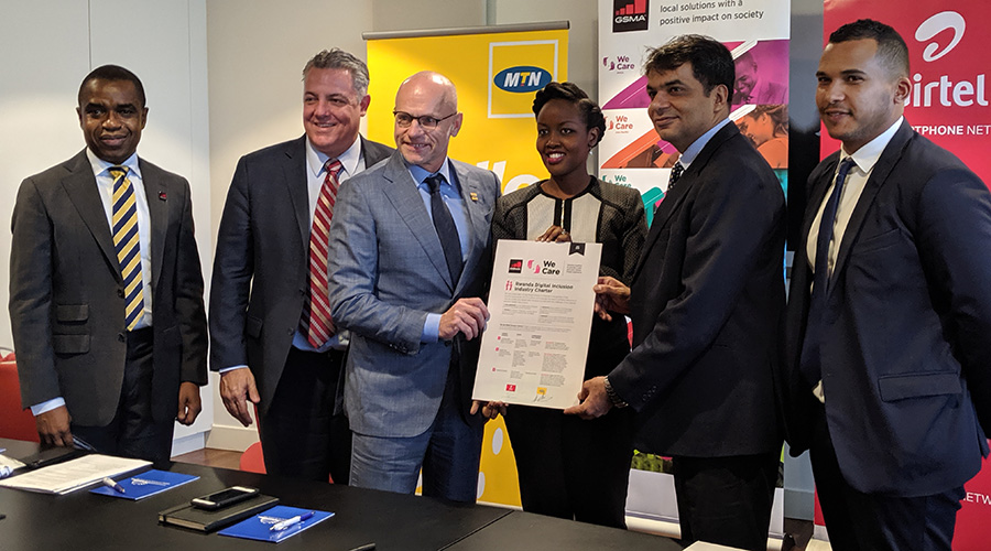 MTN Rwanda and Airtel Rwanda CEOs pose with Rwanda's ICT & Innovation Minister, Paula Ingabire (centre) after signing a charter at GSMA Mobile 360 Africa on Tuesday.