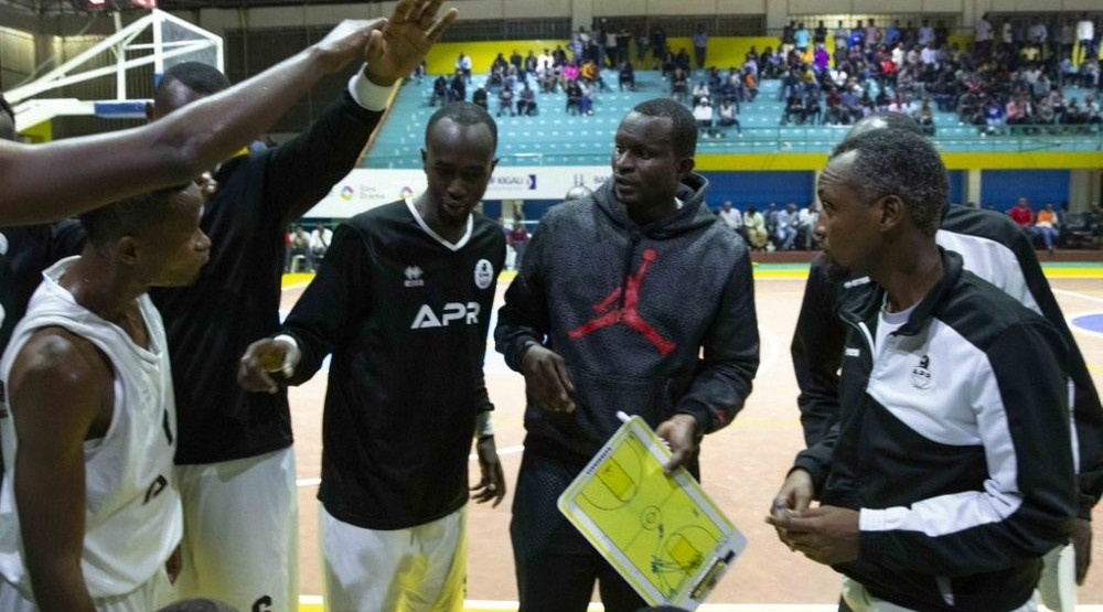 APR head coach Aime Karim Nkusi speaks to his players during a past league game against IPRC-Kigali at Amahoro Indoor Stadium. / File