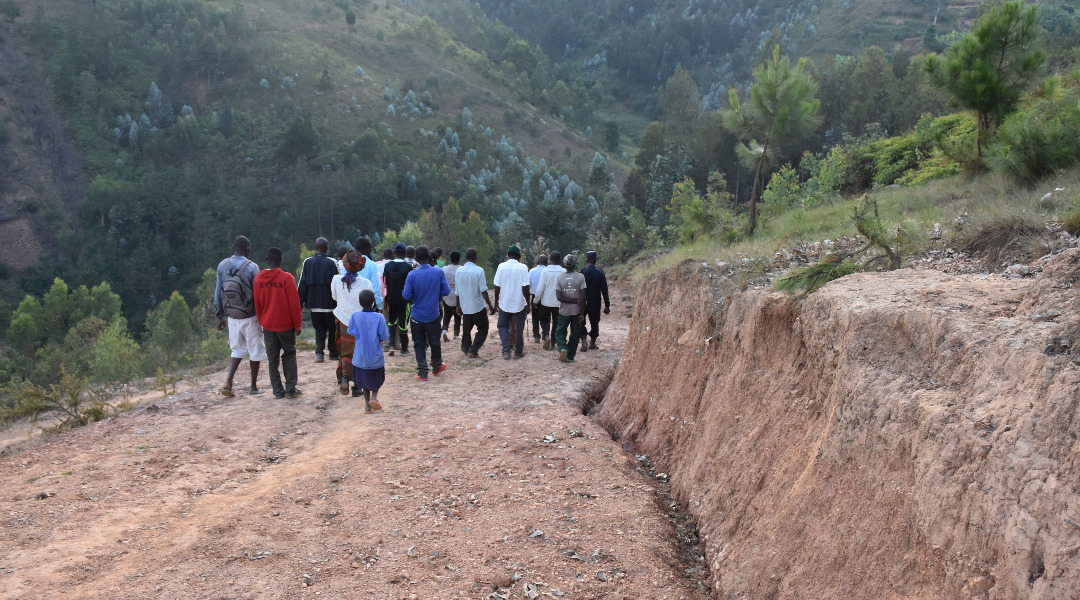 Government officials and members of the community touring the road. / Courtesy