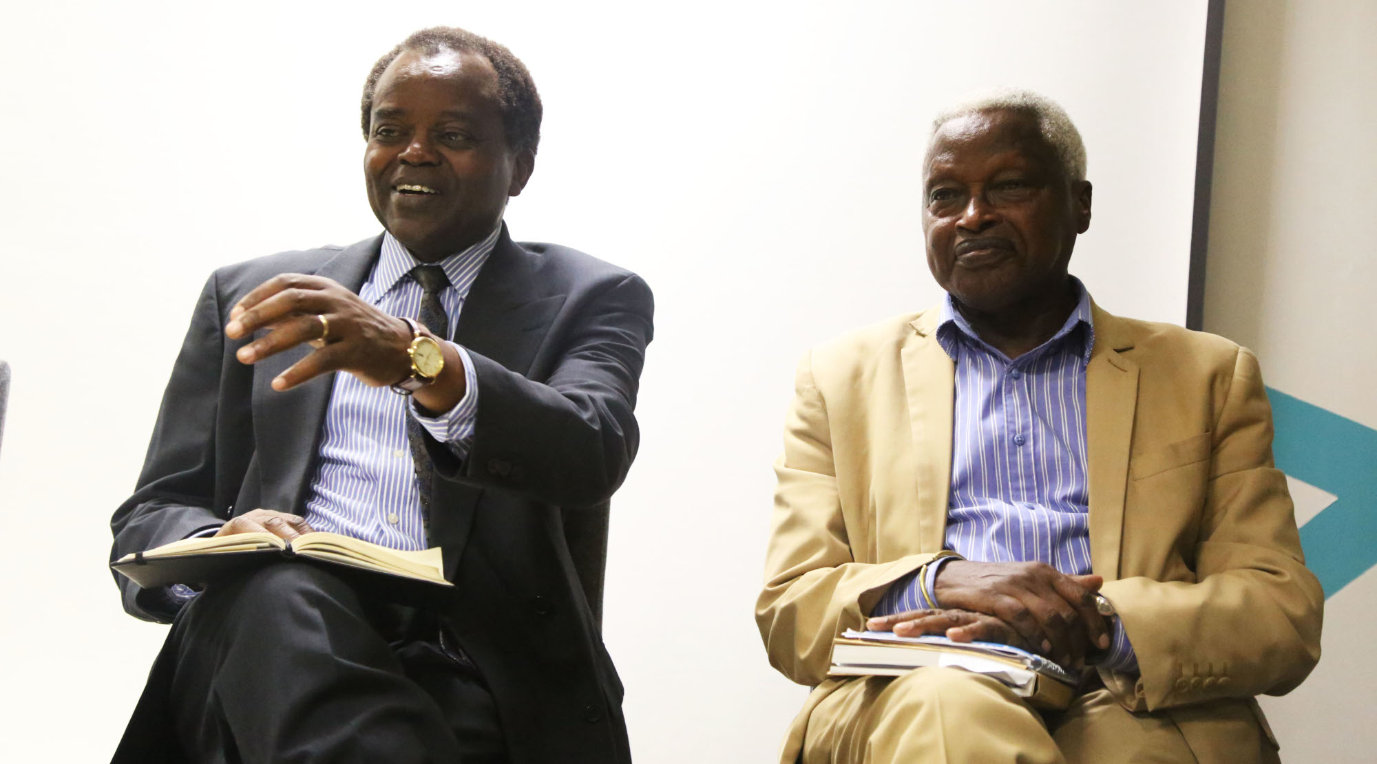 Prof Tharsisse Gatwa (L) and Prof Deogratius Mbonyinkebe during the official launch of the book in Kigali on Friday. / Sam Ngendahimana