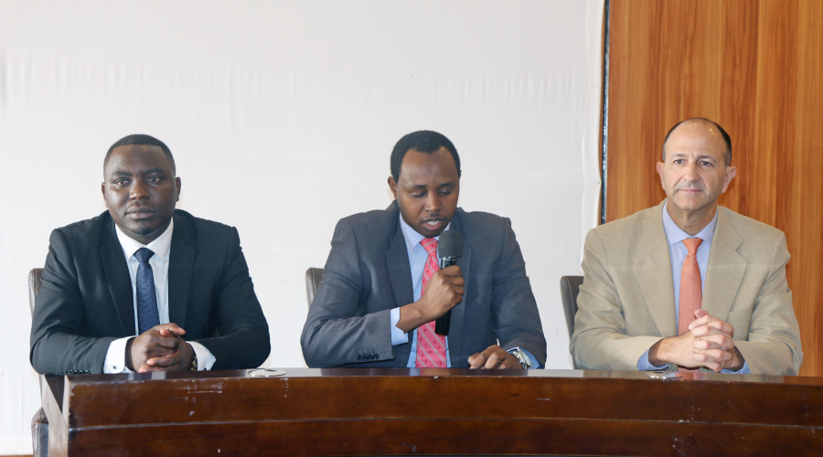 Jean de Dieu Tuyisenge, Director of Radiation Safety Regulation at RURA, Robert Nyamvumba, the Energy Division Manager at the Ministry of Infrastructure, and Eric Reber, a transport safety specialist at the IAEA during the meeting. / Emmanuel Kwizera