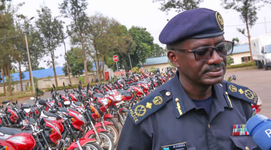 Commissioner of Police John Bosco Kabera, the RNP spokesperson with some of the impounded motorcycles. / Courtesy