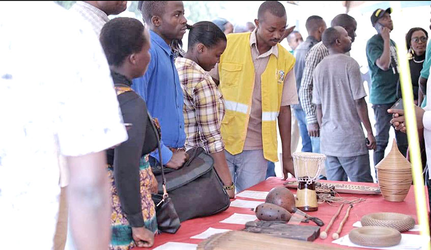 Revellers visit stalls during the Kigali Music Exhibition Week at Kigali Car-Free Zone. /Courtesy photos.