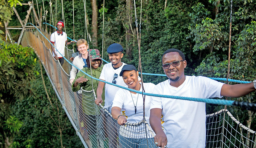 Local tourists enjoy a walk on the canopy in Nyungwe National Park. File.
