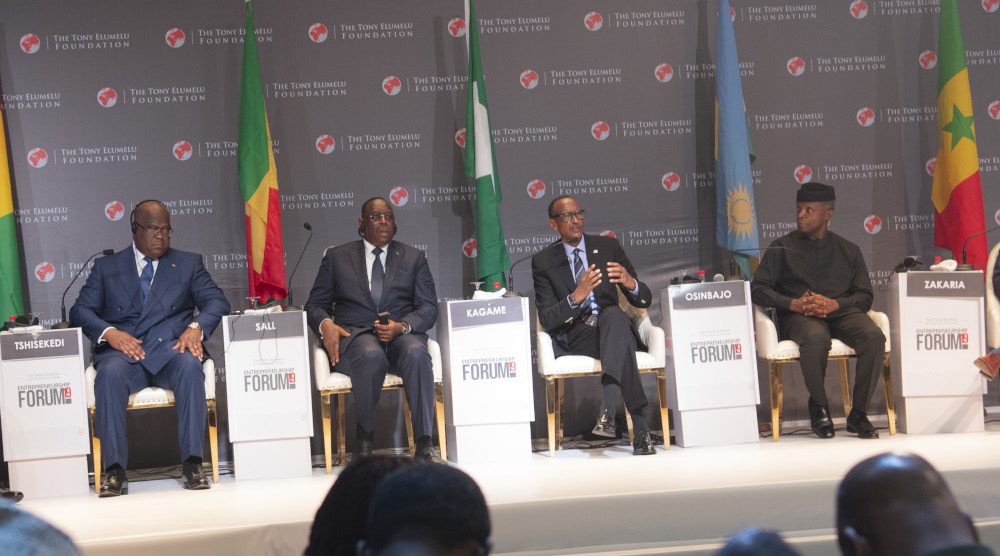 President Paul Kagame speaks on a panel alongside President Fu00e9lix Tshisekedi of DR Congo (left), President Macky Sall of Senegal (2nd left), and Nigerian Vice President Yemi Osinbajo (right) during this yearu2019s edition of the Tony Elumelu Foundation Entrepreneurship Forum in Abuja, yesterday. / Village Urugwiro