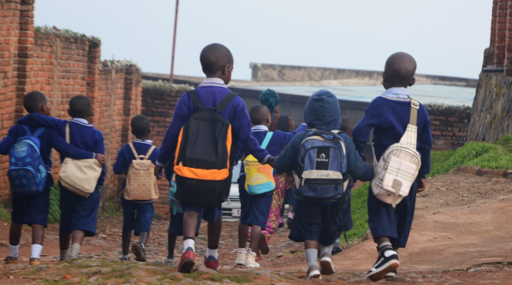 Pupils on their way to school. Private schools have been faulted for ignoring Ministerial orders to have Kinyarwanda as a medium of instruction. / File